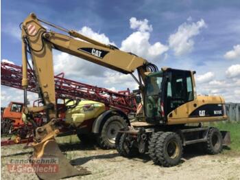 Колёсный экскаватор CATERPILLAR M315C