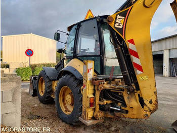 Экскаватор-погрузчик CATERPILLAR