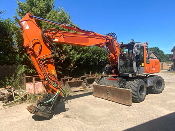 Колёсный экскаватор HITACHI ZX160W