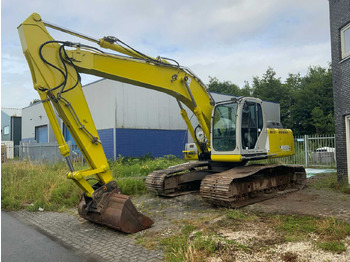 Гусеничный экскаватор NEW HOLLAND E215B