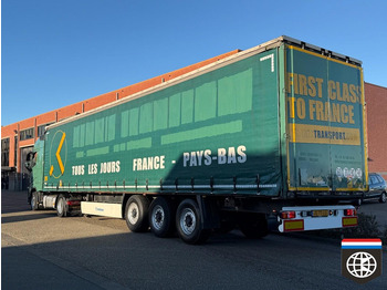 Тентованный грузовик