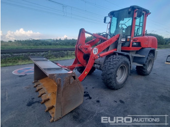 Колёсный погрузчик TAKEUCHI