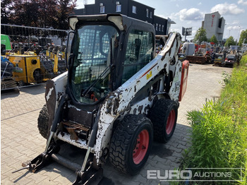 Мини-погрузчик с бортовым поворотом BOBCAT