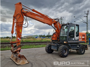 Колёсный экскаватор HITACHI ZX140W-3
