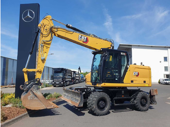 Колёсный экскаватор CATERPILLAR M318