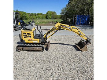 Мини-экскаватор NEW HOLLAND