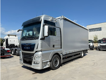 Тентованный грузовик MAN TGX
