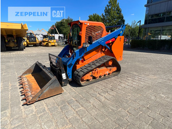 Мини-погрузчик с бортовым поворотом CATERPILLAR