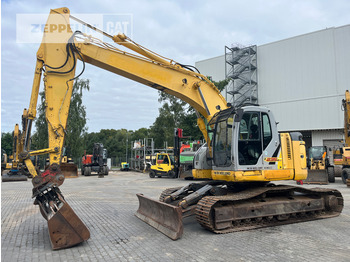 Гусеничный экскаватор NEW HOLLAND