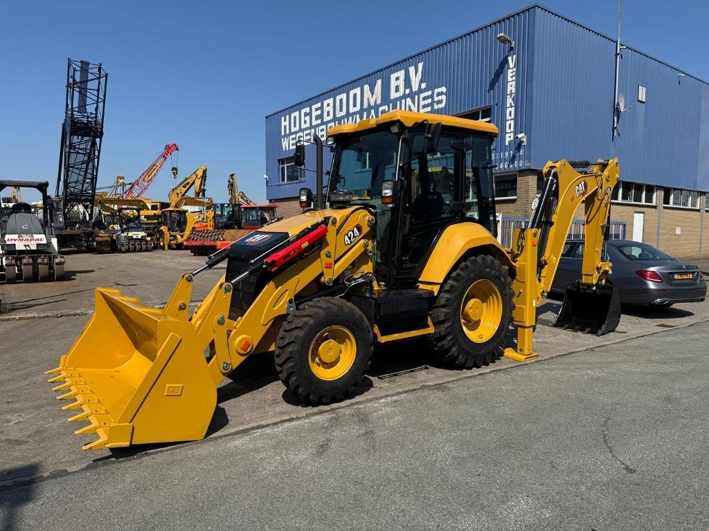 CAT 424 4X4 HAMMER LINE ( UNUSED ) - Экскаватор-погрузчик: фото 1 CAT 424 4X4 HAMMER LINE ( UNUSED ) - Экскаватор-погрузчик: фото 1