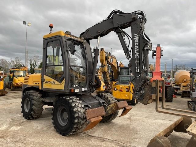 Mecalac 12 MTX - Колёсный экскаватор: фото 1 Mecalac 12 MTX - Колёсный экскаватор: фото 1