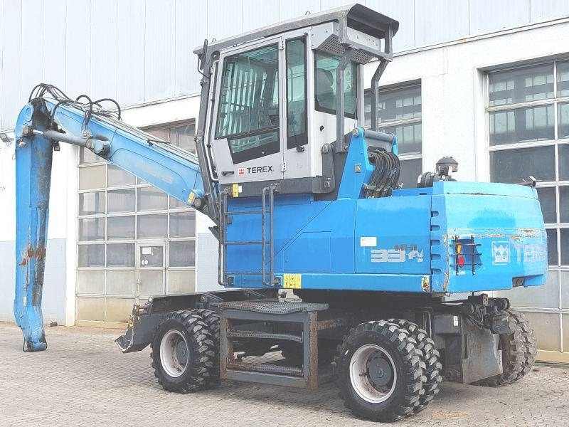 Fuchs MHL 334 E - Перегружатель: фото 3 Fuchs MHL 334 E - Перегружатель: фото 3