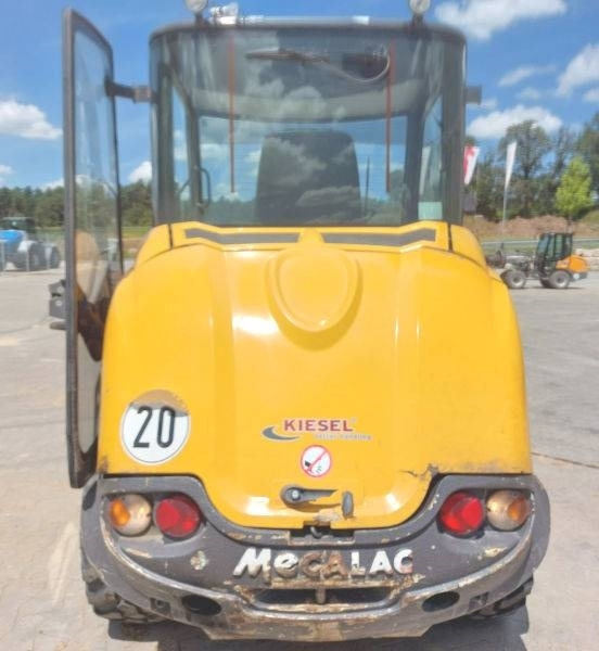 Mecalac AX 1000 - Мини-погрузчик с бортовым поворотом: фото 3 Mecalac AX 1000 - Мини-погрузчик с бортовым поворотом: фото 3