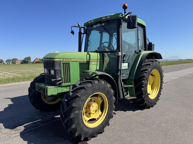 John Deere 6300 - Трактор: фото 1 John Deere 6300 - Трактор: фото 1