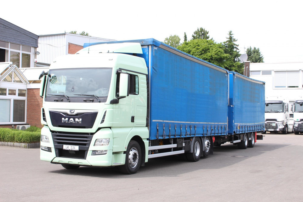MAN TGX 26.460 Jumbo Retarder Hubdach Durchlade - Тентованный грузовик: фото 1 MAN TGX 26.460 Jumbo Retarder Hubdach Durchlade - Тентованный грузовик: фото 1