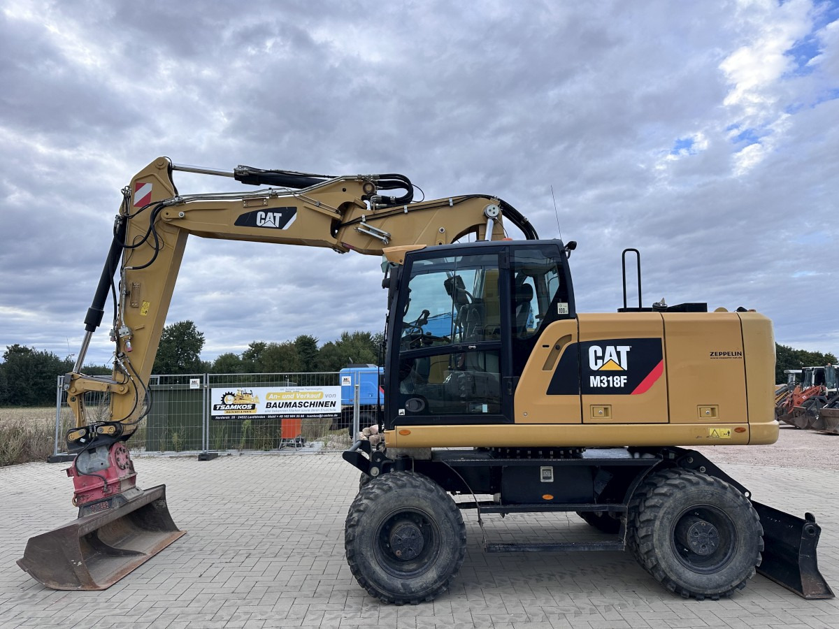 CATERPILLAR M 318 F Offset boom Deutsche Maschine Top ! - Колёсный экскаватор: фото 1 CATERPILLAR M 318 F Offset boom Deutsche Maschine Top ! - Колёсный экскаватор: фото 1