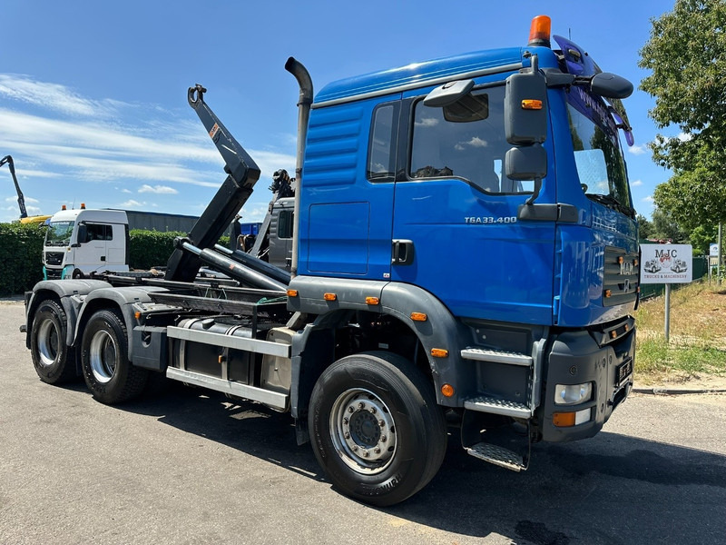 MAN TGA 33.400 6X4 HOOKLIFT AJK NHS20-4930mm - WB 3m60 - MANUAL ZF - STEEL SPRING / BLATT - BIG AXLES / AP ACHSEN - Крюковой мультилифт: фото 1 MAN TGA 33.400 6X4 HOOKLIFT AJK NHS20-4930mm - WB 3m60 - MANUAL ZF - STEEL SPRING / BLATT - BIG AXLES / AP ACHSEN - Крюковой мультилифт: фото 1