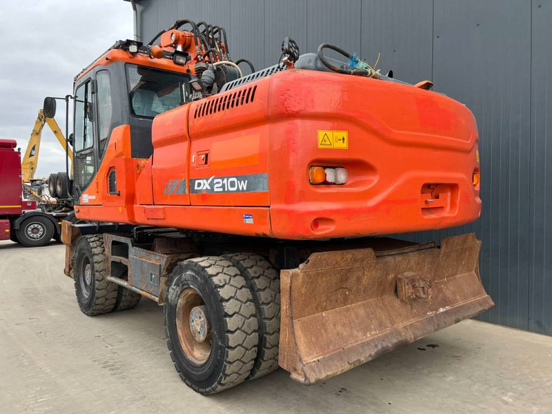 Doosan DX210W - Колёсный экскаватор: фото 2 Doosan DX210W - Колёсный экскаватор: фото 2