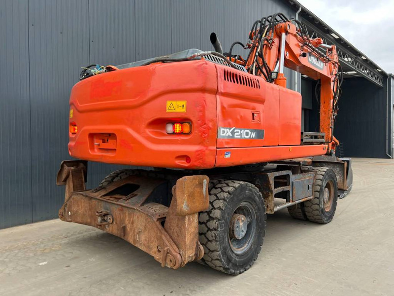 Doosan DX210W - Колёсный экскаватор: фото 4 Doosan DX210W - Колёсный экскаватор: фото 4