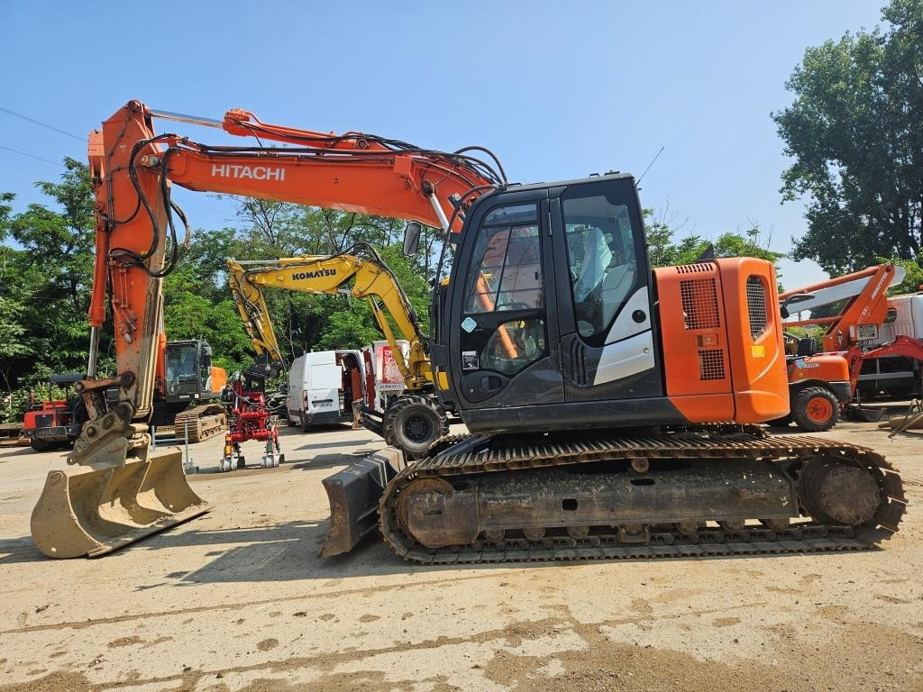 HITACHI ZX 135 US - Гусеничный экскаватор: фото 1 HITACHI ZX 135 US - Гусеничный экскаватор: фото 1