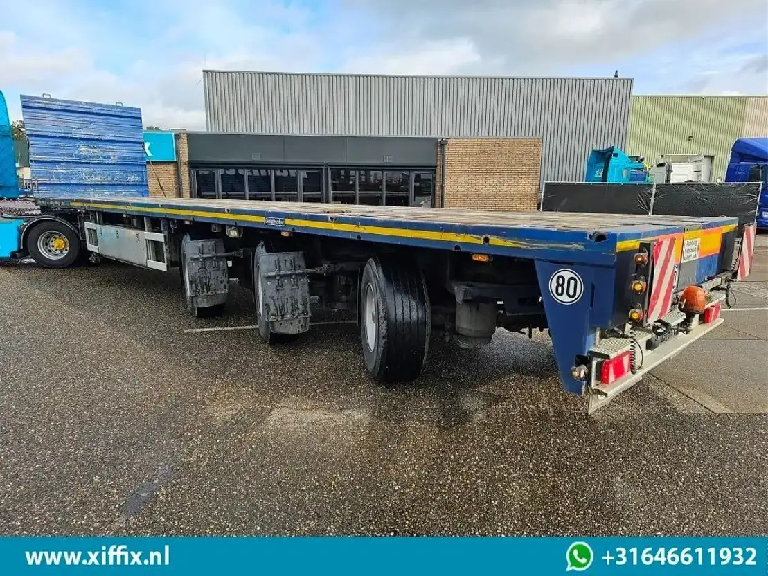 Goldhofer 3-ass. Vlakke uitschuifbare oplegger / 3x gestuurd - Полуприцеп бортовой/ Платформа: фото 3 Goldhofer 3-ass. Vlakke uitschuifbare oplegger / 3x gestuurd - Полуприцеп бортовой/ Платформа: фото 3
