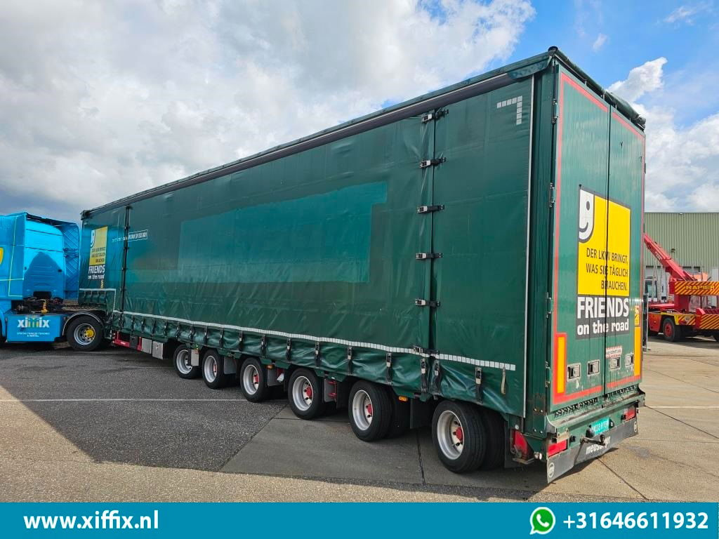 Meusburger 6-ass. Semi dieplader met elektische huifopbouw / 3x naloop gestuurd - Низкорамный полуприцеп: фото 4 Meusburger 6-ass. Semi dieplader met elektische huifopbouw / 3x naloop gestuurd - Низкорамный полуприцеп: фото 4