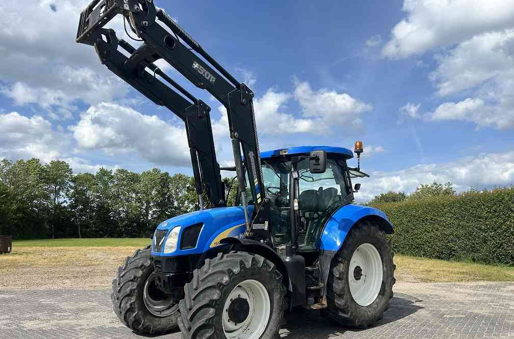 New Holland TSA 125, frontlader - Трактор: фото 1 New Holland TSA 125, frontlader - Трактор: фото 1