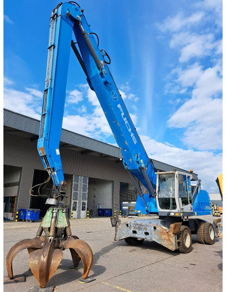 Fuchs MHL 350 E - Перегружатель: фото 1 Fuchs MHL 350 E - Перегружатель: фото 1