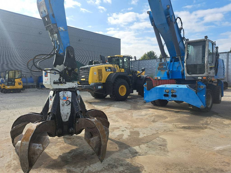 Fuchs MHL 360 D - Перегружатель: фото 1 Fuchs MHL 360 D - Перегружатель: фото 1