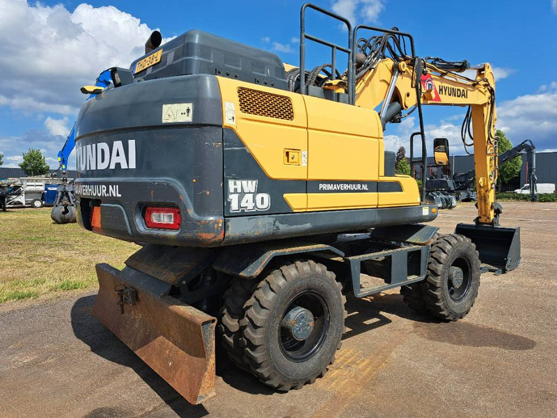 Hyundai HW140 - Колёсный экскаватор: фото 3 Hyundai HW140 - Колёсный экскаватор: фото 3