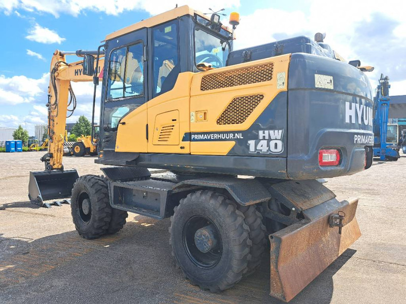 Hyundai HW140 - Колёсный экскаватор: фото 1 Hyundai HW140 - Колёсный экскаватор: фото 1