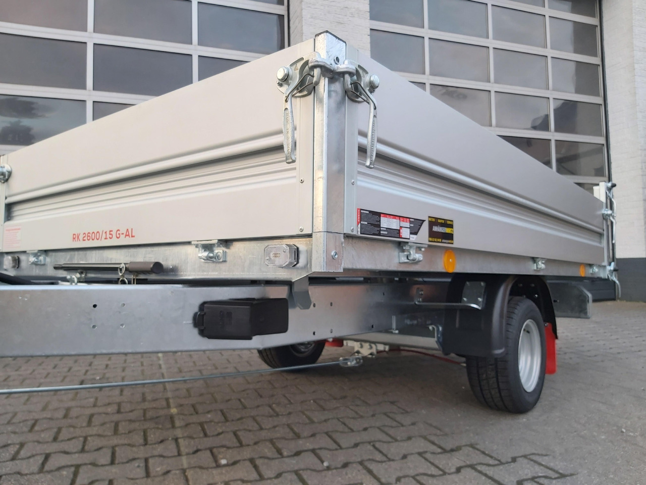 Pongratz Kipper RK 2600/15 G-AL 260x151x36cm Stahlboden Pendelklappe 10" 1500kg Aktion - Самосвальный прицеп: фото 4 Pongratz Kipper RK 2600/15 G-AL 260x151x36cm Stahlboden Pendelklappe 10" 1500kg Aktion - Самосвальный прицеп: фото 4