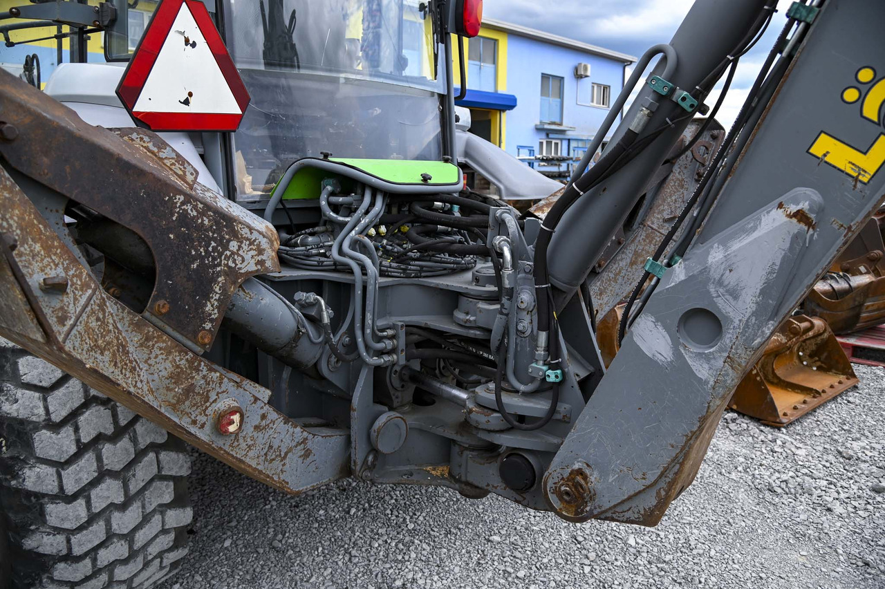 Экскаватор-погрузчик Lännen 8600E: фото 39 Экскаватор-погрузчик Lännen 8600E: фото 39