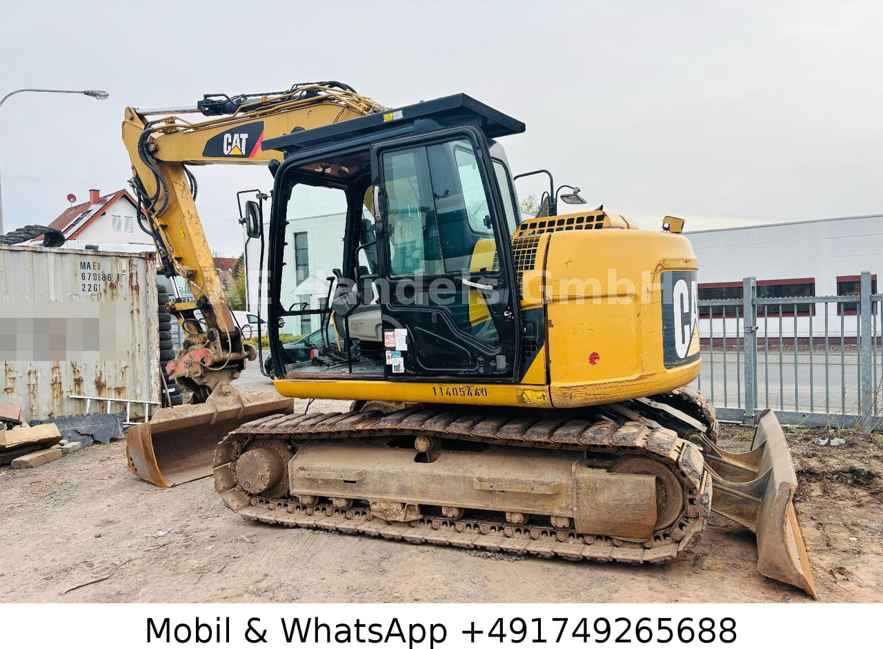 CAT 311D *6600Std./Schnellwechsler/Schaufel/Klima - Гусеничный экскаватор: фото 4 CAT 311D *6600Std./Schnellwechsler/Schaufel/Klima - Гусеничный экскаватор: фото 4