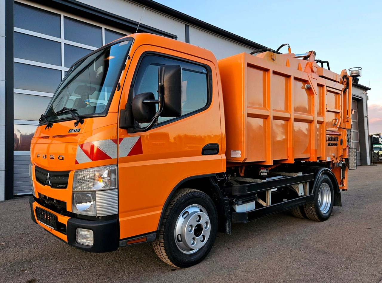 Mitsubishi Fuso Canter 6S15 Zoeller Micro Müllpresse - Мусоровоз: фото 1 Mitsubishi Fuso Canter 6S15 Zoeller Micro Müllpresse - Мусоровоз: фото 1