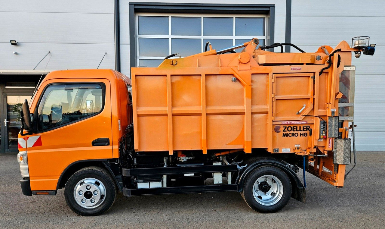 Mitsubishi Fuso Canter 6S15 Zoeller Micro Müllpresse - Мусоровоз: фото 2 Mitsubishi Fuso Canter 6S15 Zoeller Micro Müllpresse - Мусоровоз: фото 2