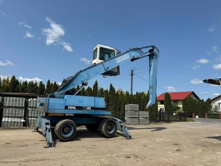 Koparka przeładunkowa Fuchs MHL 330 - Перегружатель: фото 1 Koparka przeładunkowa Fuchs MHL 330 - Перегружатель: фото 1