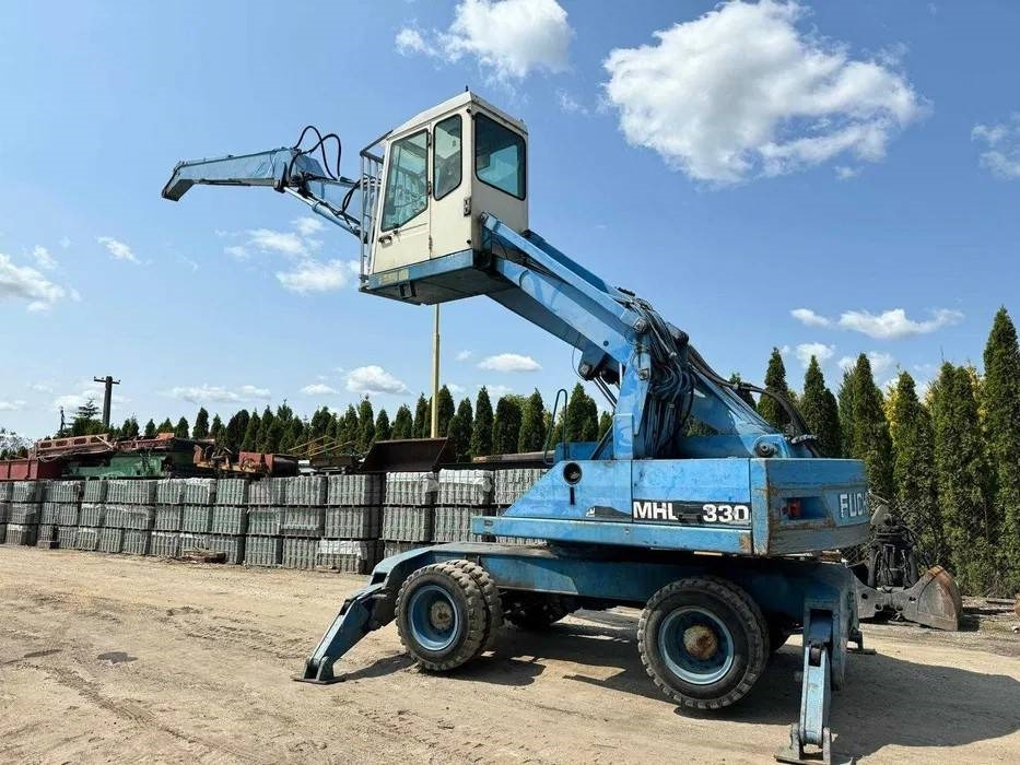 Koparka przeładunkowa Fuchs MHL 330 - Перегружатель: фото 2 Koparka przeładunkowa Fuchs MHL 330 - Перегружатель: фото 2