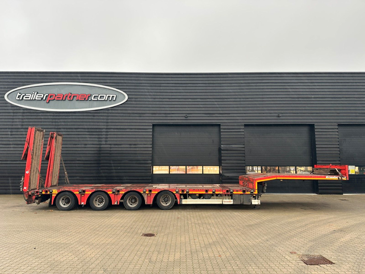 Kässbohrer 4 achs tieflader / ausziehbar - Низкорамный полуприцеп: фото 1 Kässbohrer 4 achs tieflader / ausziehbar - Низкорамный полуприцеп: фото 1