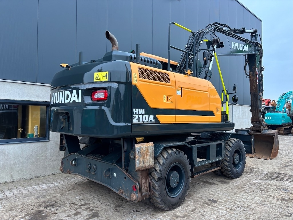 Hyundai HW 210 A - HW210 - R210W - HW180 - Колёсный экскаватор: фото 5 Hyundai HW 210 A - HW210 - R210W - HW180 - Колёсный экскаватор: фото 5