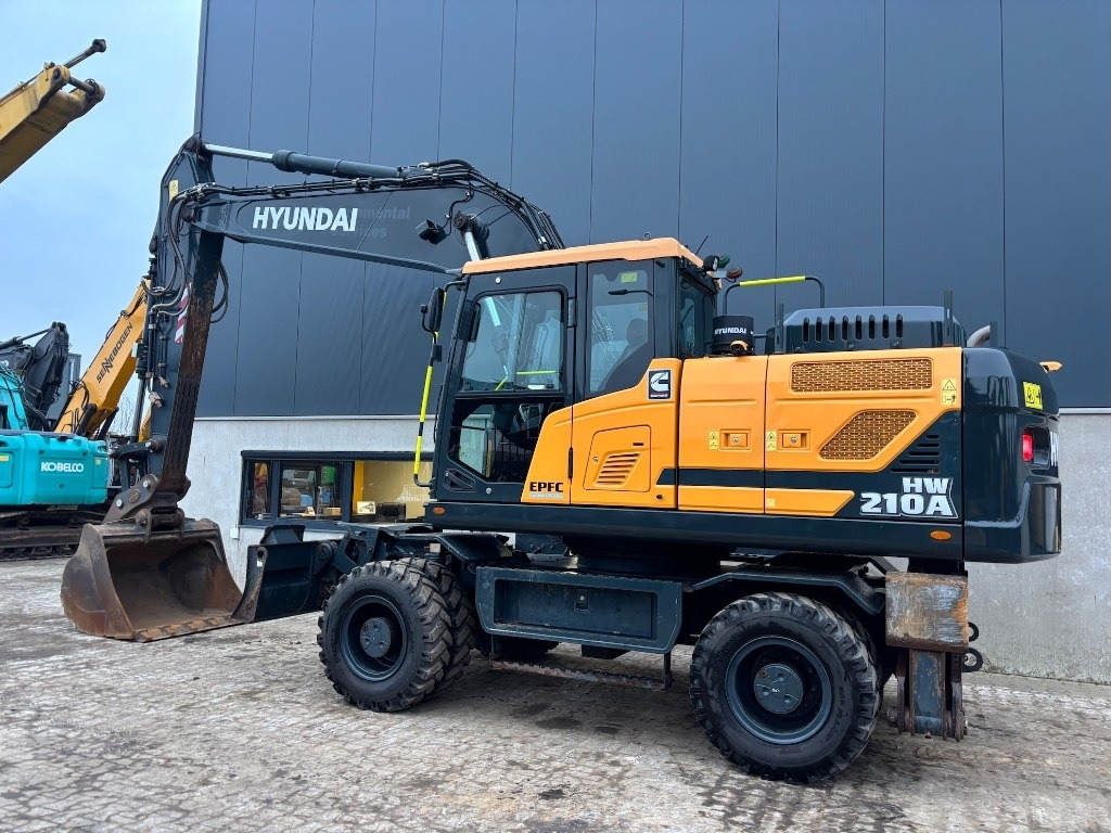 Hyundai HW 210 A - HW210 - R210W - HW180 - Колёсный экскаватор: фото 2 Hyundai HW 210 A - HW210 - R210W - HW180 - Колёсный экскаватор: фото 2