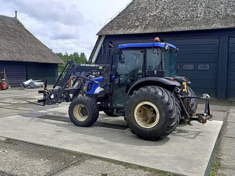 New Holland TN60DA TN60D met voorlader 520TL en vork - Трактор: фото 3 New Holland TN60DA TN60D met voorlader 520TL en vork - Трактор: фото 3