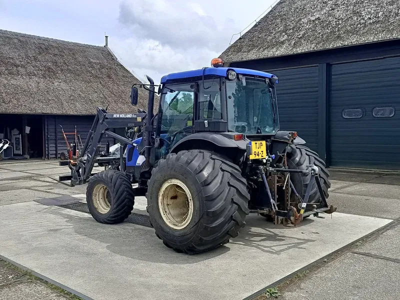 New Holland TN60DA TN60D met voorlader 520TL en vork - Трактор: фото 4 New Holland TN60DA TN60D met voorlader 520TL en vork - Трактор: фото 4