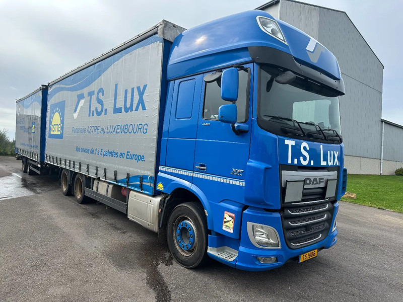 DAF XF 440 6x2 / SUPERSPACECAB / KOMBI MIT ANHANGER SCHMITZ 2016 / DURCHLADEN / 2 STUCK - Тентованный грузовик: фото 2 DAF XF 440 6x2 / SUPERSPACECAB / KOMBI MIT ANHANGER SCHMITZ 2016 / DURCHLADEN / 2 STUCK - Тентованный грузовик: фото 2