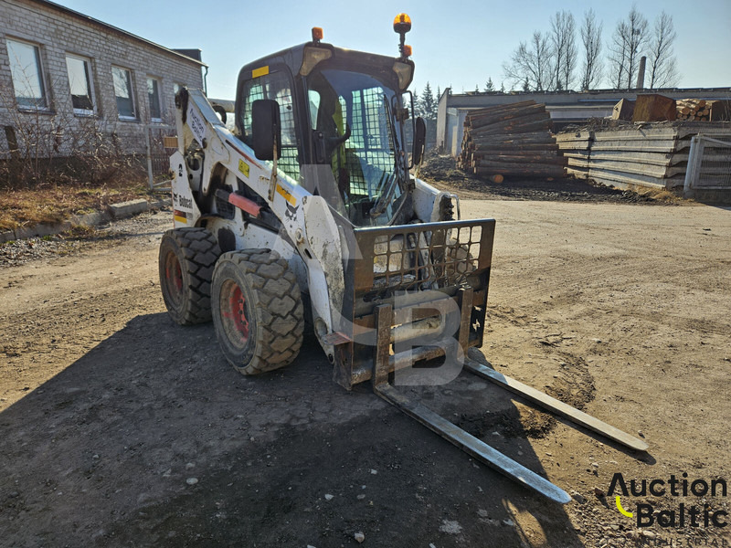 Bobcat S 650 - Мини-погрузчик с бортовым поворотом: фото 1 Bobcat S 650 - Мини-погрузчик с бортовым поворотом: фото 1