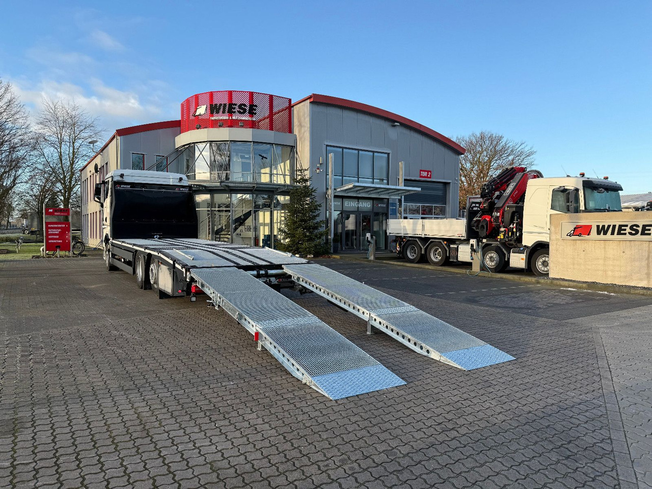 MAN Baumaschinen- Arbeitsbühnentransporter Rampen - Грузовик бортовой/ Платформа: фото 1 MAN Baumaschinen- Arbeitsbühnentransporter Rampen - Грузовик бортовой/ Платформа: фото 1