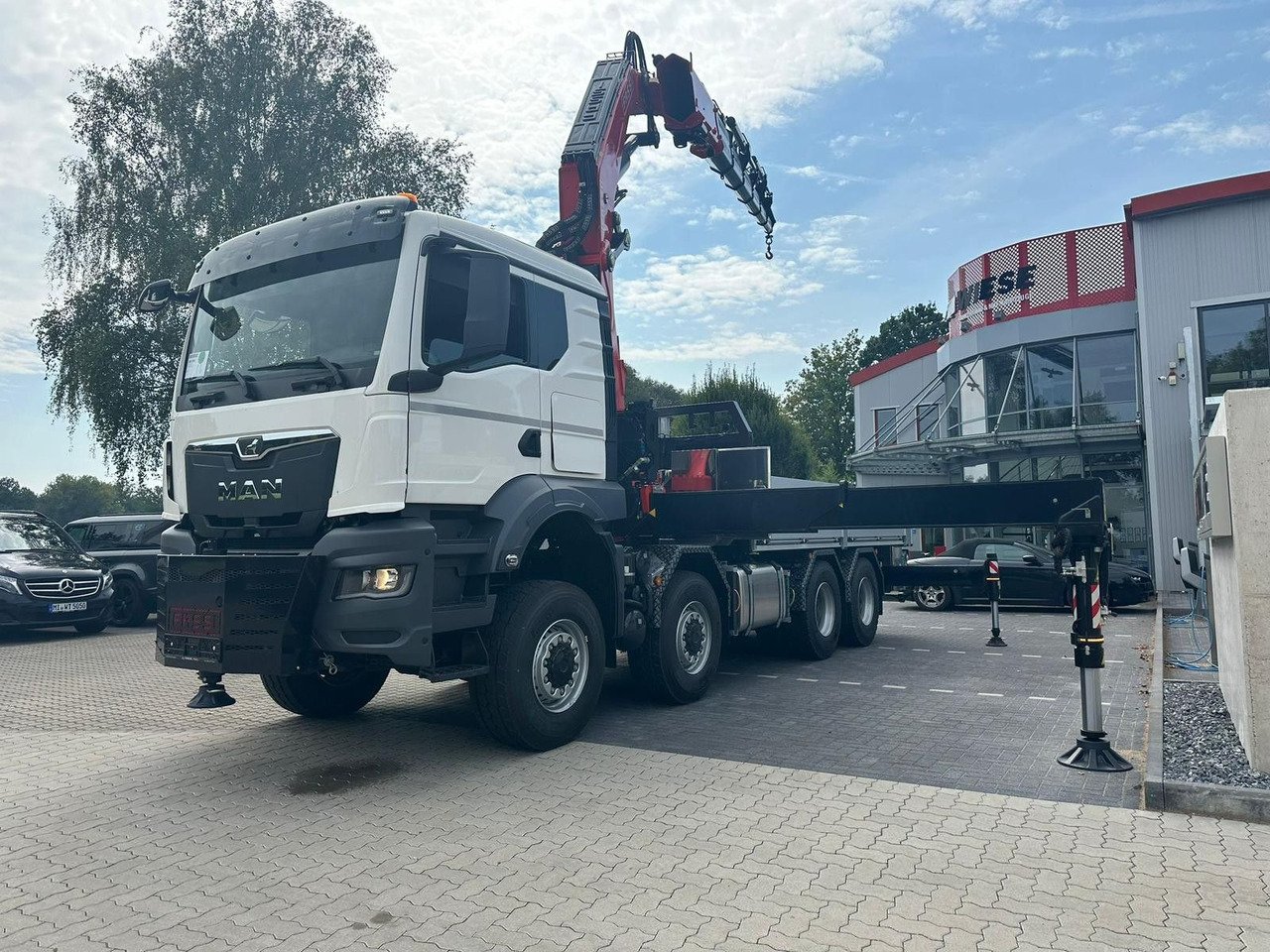 MAN TGS 41.520 8x8 mit Fassi Ladekran F710RA.2.26 - Грузовик бортовой/ Платформа: фото 2 MAN TGS 41.520 8x8 mit Fassi Ladekran F710RA.2.26 - Грузовик бортовой/ Платформа: фото 2
