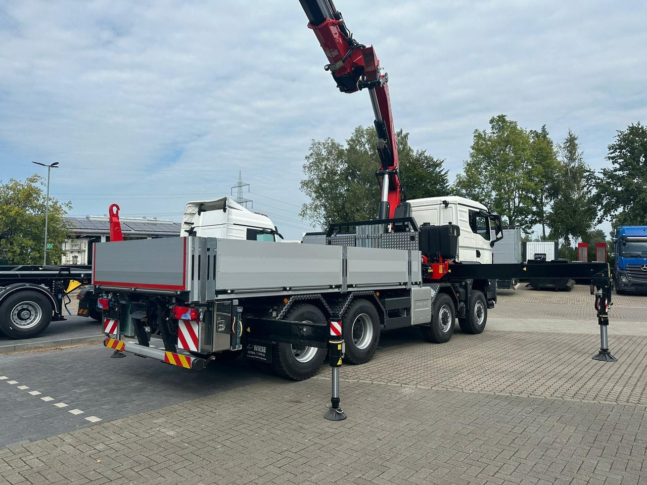 MAN TGS 41.520 8x8 mit Fassi Ladekran F710RA.2.26 - Грузовик бортовой/ Платформа: фото 3 MAN TGS 41.520 8x8 mit Fassi Ladekran F710RA.2.26 - Грузовик бортовой/ Платформа: фото 3