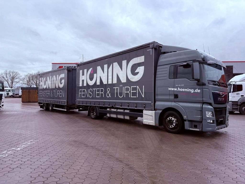 MAN TGX 18.440 LL Volumen LKW mit Staplerhalterung - Тентованный грузовик: фото 1 MAN TGX 18.440 LL Volumen LKW mit Staplerhalterung - Тентованный грузовик: фото 1