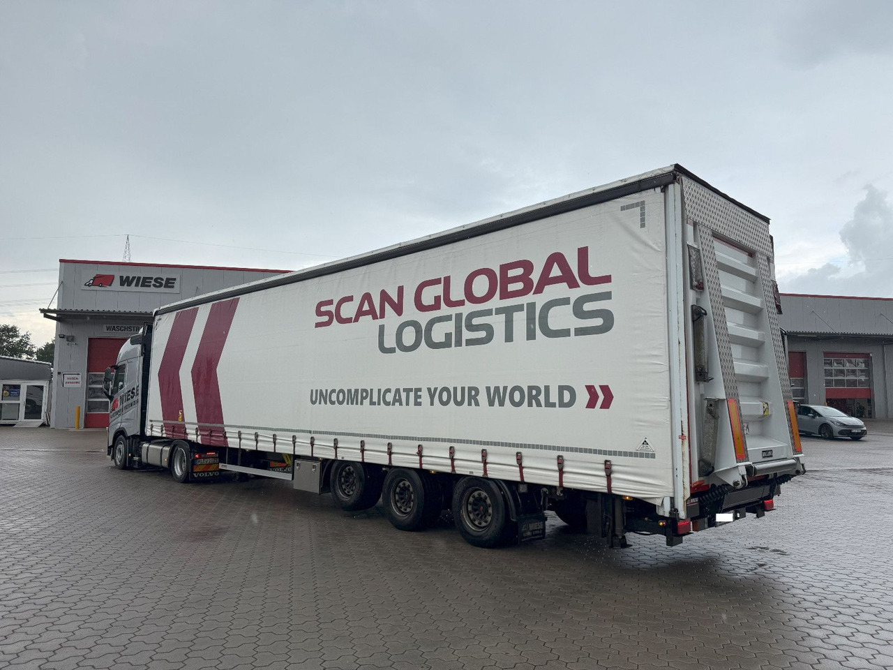 Wiese Mega Schiebeplane mit Dhollandia Rampe 9t - Низкорамный полуприцеп: фото 1 Wiese Mega Schiebeplane mit Dhollandia Rampe 9t - Низкорамный полуприцеп: фото 1